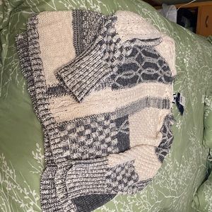 Beautiful sweater. new with tags size is XXL. Pet and smoke free home.